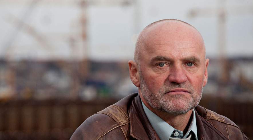 Den polske snedker Andrzej Strugala har rejst i lande som Irak, Sverige, Ungarn og Tyskland for at forsørge sine tre børn og kone i Polen. Han står nu frem, fordi Budomex er den værste arbejdsgiver, han nogensinde har haft. (Foto: Niels Åge Skovbo)