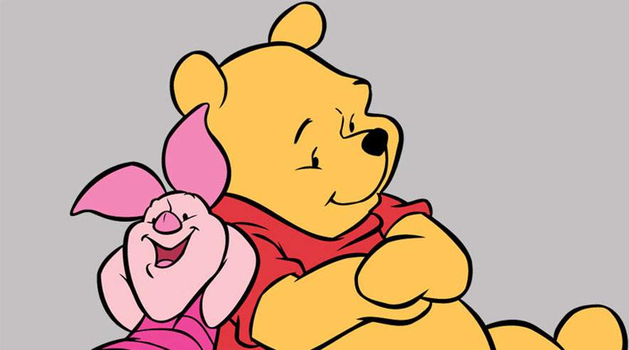 "Hvis du får et sug i maven, skal du ikke være nervøs. Du er sikkert bare sulten". Den godmodige bjørn fra 100 Meter Skoven giver gode råd, som nutidens medarbejdere også kan lære noget af. (Ophavsretskilde: Egmont)