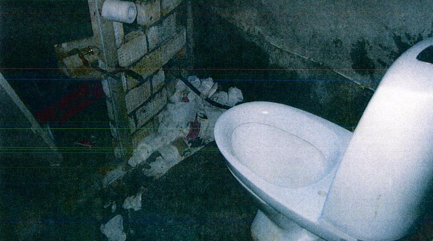 Toiletforholdene for de rumænske arbejdere. (Foto: Politiet)