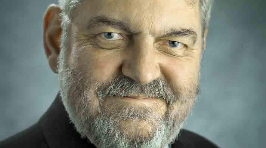 Postdirektør Helge Israelsen har revurderet sin beslutning. Så de 28.000 ansatte kan se frem til en julegave. (Foto: Post Danmark.)