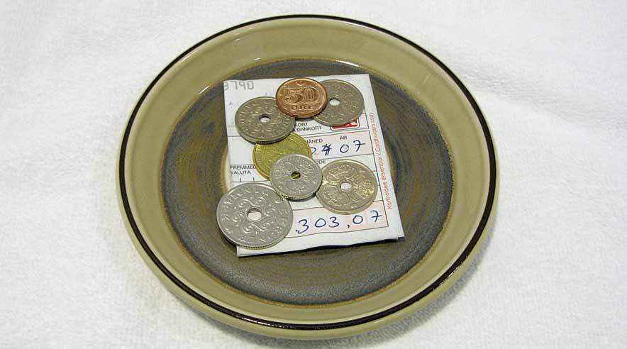 En tjener får efter en opmandskendelse 3.000 kroner i hånden som kompensation for drikkepenge, arbejdsgiveren havde taget. (Arkivfoto.)